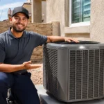 HVAC technician next to a residential refrigerated air system outside a home in El Paso